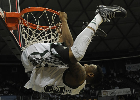 Hawaii guard Brandon Spearman threw down on his senior night in March. Bruce Asato / Honolulu Star-Advertiser.