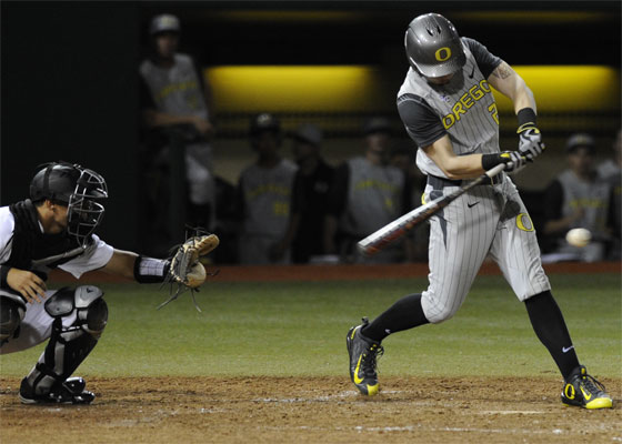 Oregon shortstop Mark Karaviotis batted against Hawaii on Friday night. Photo by Bruce Asato/Star-Advertiser.