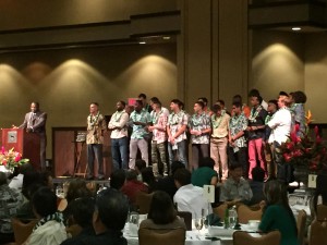 The complete team gathered on stage to receive awards.