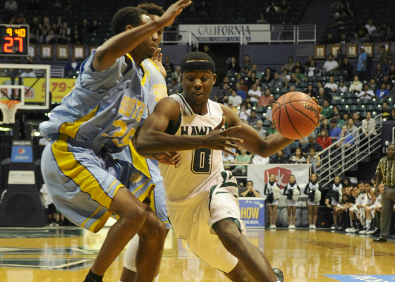 Isaac Fleming goes against Southern's Joell Hopkins. Bruce Asato / basato@staradvertiser.com