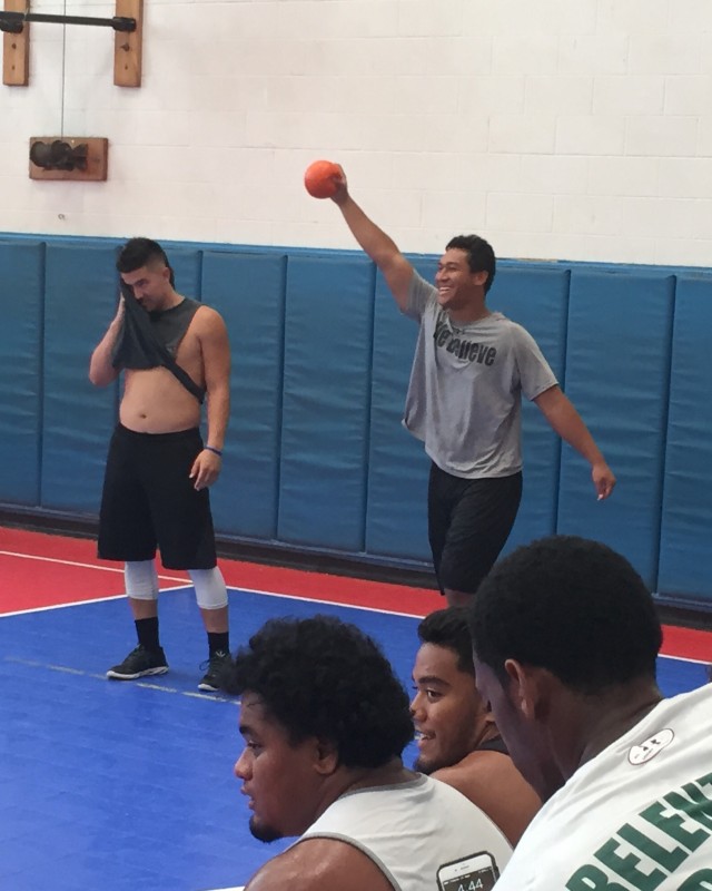 Andrew Ho and tight end Dakota Torres