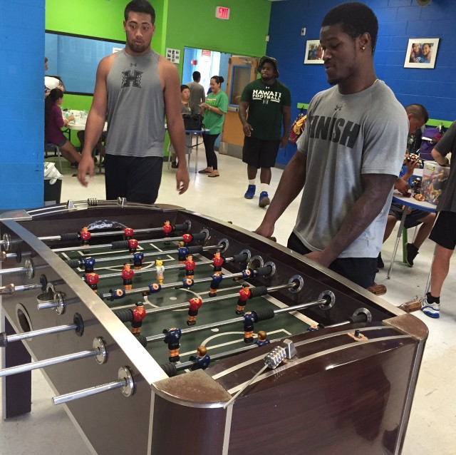 Jamie Tago and safety Daniel Lewis