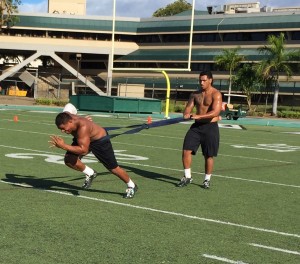 Inside linebacker Benetton Fonua and fullback Justin Vele 