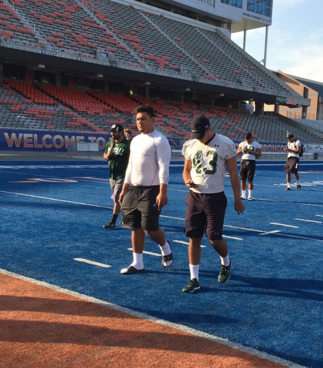 Kennedy Tulimasealii and slotback Dylan Collie