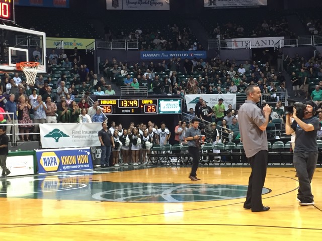 New Hawaii football coach Nick Rolovich spoke to the crowd at halftime of Wednesday's UH game against Arkansas-Pine Bluff.
