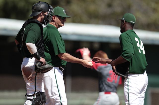 Hawaii coach Mike Trapasso has had to make quite a few mound visits this season. Photo by Jamm Aquino/Star-Advertiser.