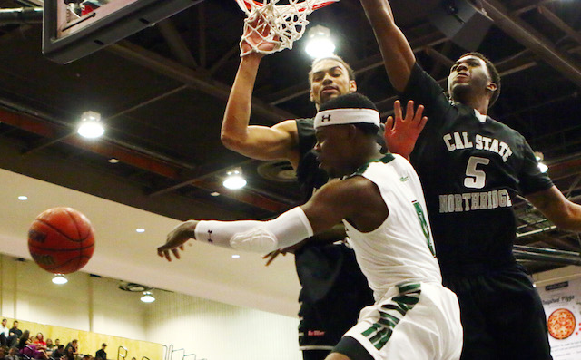 Isaac Fleming won't be dishing any more passes in a UH uniform. / Darrell Miho, Special to the Star-Advertiser