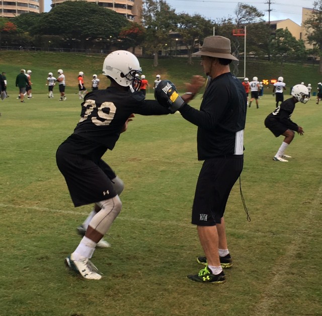 Safety Trayvon Henderson and defensive coordinator Kevin Lempa
