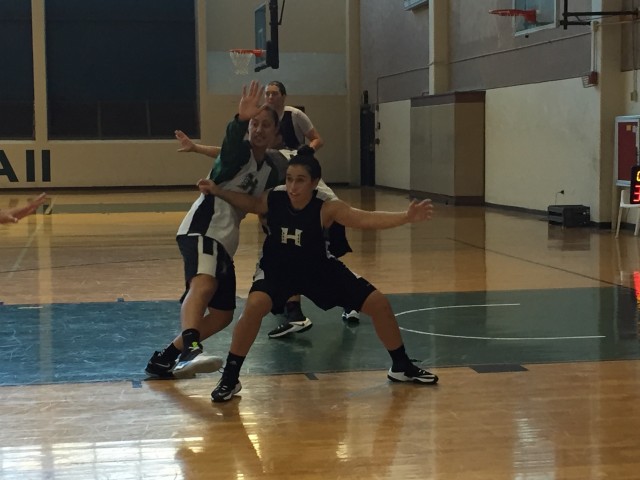 Rainbow Wahine guard Tia Kanoa posts up against Sarah Toeaina in practice on Tuesday in Gym II.