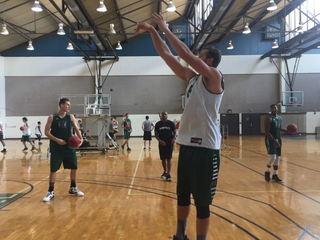 Forward Gibson Johnson put up a warm-up jumper.