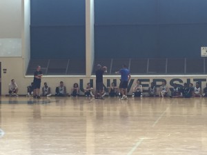 UH players and coaches listened as an official explained the rule tweaks of the 2016-17 season.