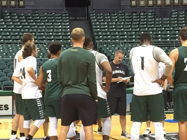 Newly minted associate head coach Adam Jacobsen directed a team huddle Tuesday night.