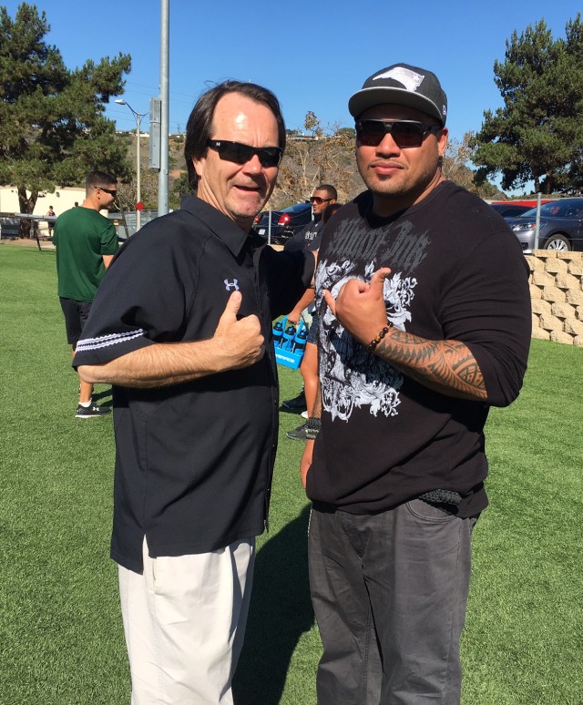 Defensive coordinator Kevin Lempa and former UH defensive tackle Lui Fuga