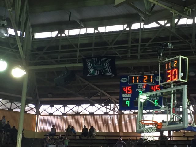 A lonely "H" flew in one corner of Bloch Arena during the Pearl Harbor Invitational.
