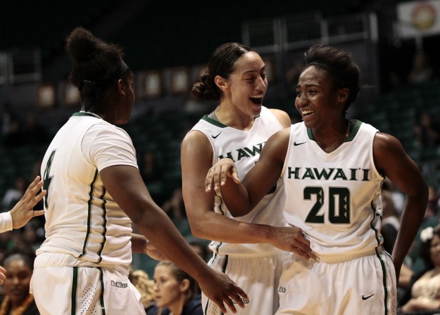 UH returnees Briana Harris (left), Sarah Toeaina and Olivia Crawford received their rings commemorating last year's NCAA tournament appearance at Thursday's "Hoopla" fundraiser. Jamm Aquino/Star-Advertiser