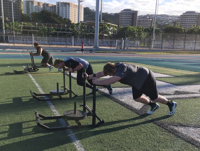 Offensive linemen Kingjames Taylor, Matt Norman and JR Hensley