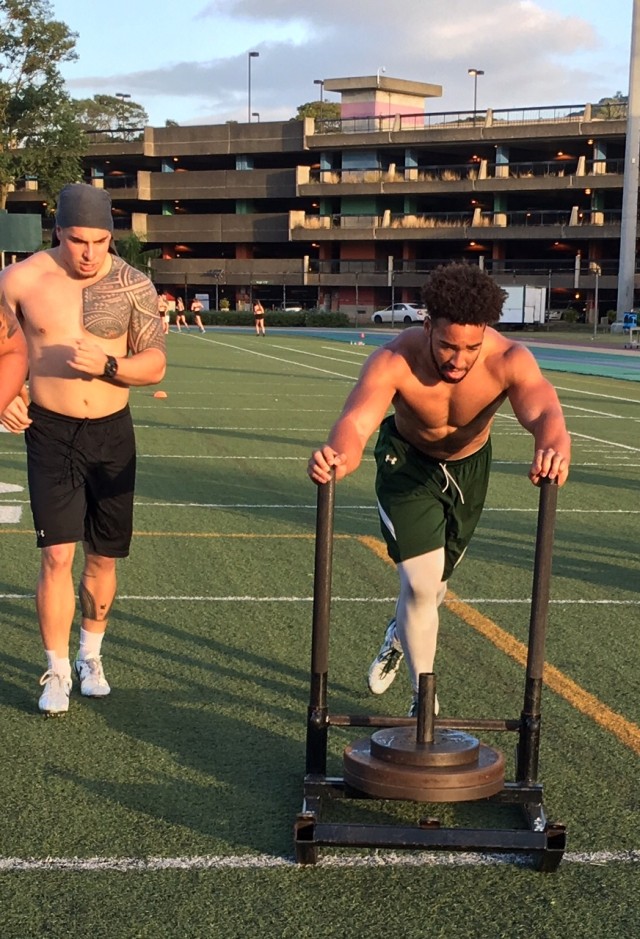 Safety Tumua Tuinei and linebacker Russell Williams Jr.