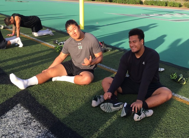 Zeno Choi and defensive tackle Viane Moala