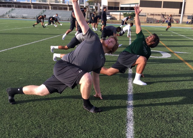 Offensive lineman JR Hensley and defensive tackle Samieula Akoteu