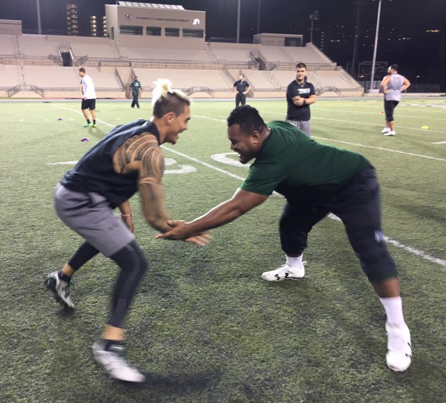 Keelan Ewaliko and nose tackle Kiko Faalologo