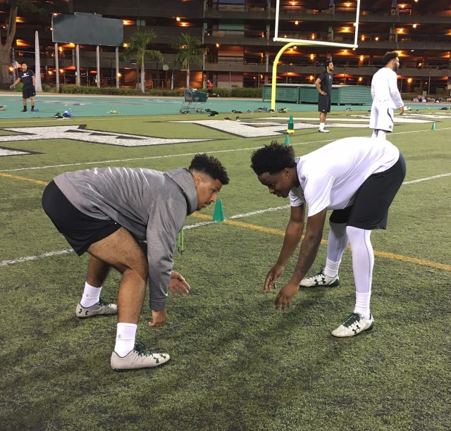 Freddie Holly and wideout Davine Tullis