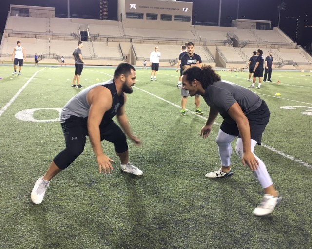 Guard/center John Wa‘a and middle linebacker Jahlani Tavai