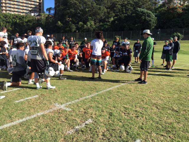 Kealoha Pilares addresses the Warriors after this morning's seventh practice of spring training