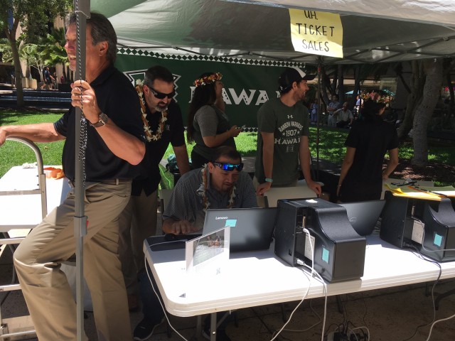 That's ticket manager Walter Watanabe handling sales and renewals